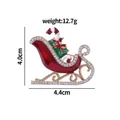 Spilla a forma di slitta natalizia rossa e oro con smalto colorato e strass lucidi - Slitta Regalo in Smalto (C2122)
