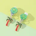 Detail of tropical palm tree clip-on earrings with green glitter and soft rubber pads - Coconut Tree