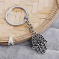 Retro Hamsa-Hand-Schlüsselanhänger aus Silber mit Hohlgravur und stabilem Metallring - Retro Silber Hol Style (D1178)