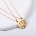 Golden heart-shaped BFF necklace set with split smiley face pendants on white display - Yellow Lightning Smile Face Pendant / Gold
