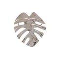 Elegant silver monstera leaf napkin ring with a polished metallic finish for dining decor - Silver