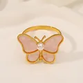 Servilletero de mariposa dorada con alas de nácar rosa y detalle de perla blanca - Rosa