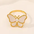 Servilletero de mariposa dorada con perla blanca y elegantes acabados de nácar natural - Blanco