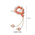 Detail of wooden bead napkin ring featuring orange maple leaf and Autumn text - Maple Leaf Pattern (Z1221)