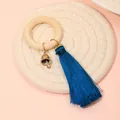 Minimalist wooden bead napkin ring with a bronze bell and elegant blue silk tassel - Bell Tassel Style (Z1201)