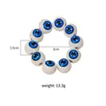 Evil eye wooden bead napkin ring with jute tassel and white circular beads ornament - Z1224