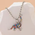 Detailed view of dinosaur pendant featuring colorful rhinestones on a silver bead chain - Brachiosaurus Style (A2904-1)