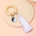 Wooden bead napkin ring featuring a Yin Yang charm and soft white decorative tassel - Tai Chi White Tassel Style (Z1202)