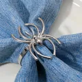 Silver spider napkin ring in alloy finish on blue linen napkin for banquet table decor - Silver