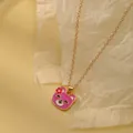 Golden necklace with pink cartoon bear pendant featuring a small red flower detail - Pink Bear Flower (A2889-18)