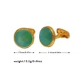 Detailweergave van luxe gouden herenmanchetknoppen met groen kristal en afmetingen - Blauw