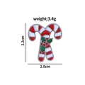 Christmas candy cane enamel brooch in red and white stripes with green holly leaf detail - Candy Cane Style (C2115-6)