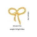 70s style gold twisted bow brooch with brushed finish, 4.5cm elegant metal pin for scarves - Gold