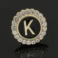Elegant gold round brooch with rhinestone border and black enamel letter K detail - C2173-K Brooch