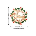 Christmas wreath brooch with reindeer and holly berries in gold-plated green enamel finish - Wreath Style (C2140)