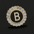 Letter B brooch with crystal rhinestones on black enamel background in gold finish - C2173-B Brooch