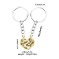 Detail van Moeder-Dochter hart puzzel sleutelhanger set met zilveren ringen en goud - Goud (D1381-GO)