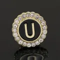 Golden round brooch with letter U on black base and sparkling crystal rhinestones - C2173-U Brooch