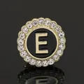 Gold plated round brooch with sparkling rhinestones and black enamel letter E detail - C2173-E Brooch