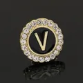 Golden round brooch with black enamel and sparkling crystal pavé around letter V - C2173-V Brooch