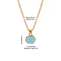 Golden necklace featuring a light blue enamel cloud pendant with a simple smiley face - Blue