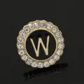 Golden round brooch with sparkling rhinestones and letter W on black background - C2173-W Brooch