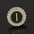 Golden round brooch with sparkling rhinestones and letter I on black background - C2173-I Brooch