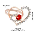 Close-up of rose gold heart napkin ring with clear crystals and a red heart gemstone - Z1318 / Rose Gold