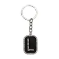 Llavero plateado brillante con colgante de letra L en pedrería sobre esmalte negro - Letra L