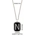 Collar hip-hop con colgante rectangular y letra N de diamantes sobre fondo negro - Letra N