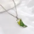 Silver chain necklace with a transparent green and yellow moon pendant on white silk fabric - Green Yellow Texture Tooth (A3061-1)
