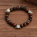 Red tiger eye stone beaded bracelet featuring vintage silver fox head charms and carvings - Fox Head Red Tiger Eye Style (G1291-10)