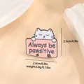 Macro-opname van de cartoon kat emaille speld met Always be pawsitive tekst en metaal - Roze Kat