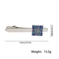Detail view of a silver tie clip with blue geometric pattern and rhinestone 6.4cm - Square Enamel Geometric Style (T1036) / Blue Tie Clip (T1036)