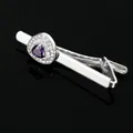 Macro shot of silver tie clip with purple triangular crystal and small white diamonds - Purple Heart Tie Clip (T1001)