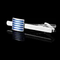 Macro shot of silver tie clip with blue enamel stripes and polished metal reflection - Blue Striped Tie Clip