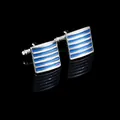 Macro shot of silver cufflinks with blue enamel stripes on professional black background - Blue Striped Cufflinks