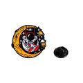 Enamel pin featuring a spaceman on a crescent moon swing with colorful star and planet - Astronaut Swinging On Moon (C2541-1)