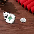 Cartoon panda enamel pin holding a green mahjong tile with silver butterfly clasp - Panda With Fortune Ingot Style (C2689-5)