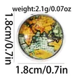 Macro shot of 1.8cm vintage world map glass cabochon with silver metal edge detailing - Retro Map (C2461)