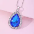 Detailed close-up of a blue pear-shaped crystal pendant necklace with silver chain - Dark Blue (A2838-6)