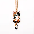 Cute calico cat pendant necklace with swinging tail in gold finish for women - Calico Cat Necklace (A3178-1)