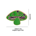 Broche champignon en émail vert avec points violets et bordure dorée incluant dimensions - Champignon Vert Taches Violettes (C2585-1)