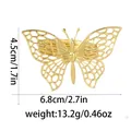 Golden butterfly napkin ring with detailed hollow wings, dimensions 6.8cm by 4.5cm - Hollow Butterfly Style (Z1121)
