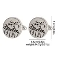 Macro shot of silver round cufflinks featuring laser-etched mountain and moon nature scenery - Forest Night View Style (B1554-5)