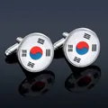 Macro shot of silver metal cufflinks with South Korean flag design on dark background - South Korea Flag Cufflinks (B1553-4)