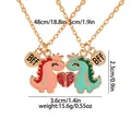 Matching BFF dinosaur crown heart necklaces with gold chains and magnetic pendants - Gold