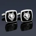 Close-up of silver men's business cufflinks with a 3D wolf head relief on black enamel - Silver Wolf Cufflinks