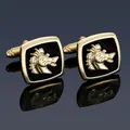 Detailed macro view of business cufflinks with golden dragon emblem on black enamel - Gold Griffin Cufflinks