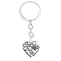 Macro shot of silver heart pendant with paw print and memorial text engraving - Black Paw Quote Keychain (D1276BL)